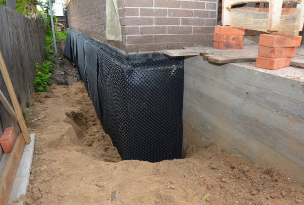 Happy homeowners after waterproofing job in Youngstown